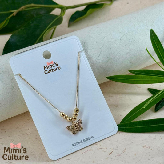 Mimi’s Golden Flutter pendent